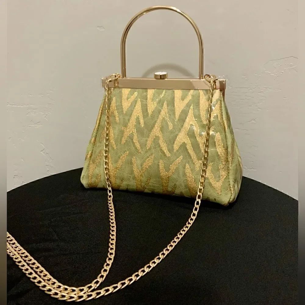 Handmade Genuine Wrinkle Texture Leather  Push-lock
Top Handle Bag & 2 Chains